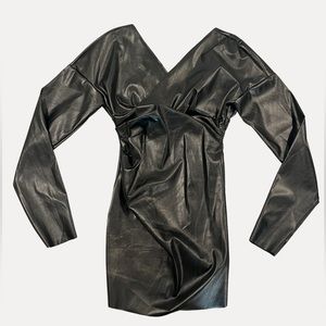 Sleek black leather type dress with deep V front & back, long sleeved